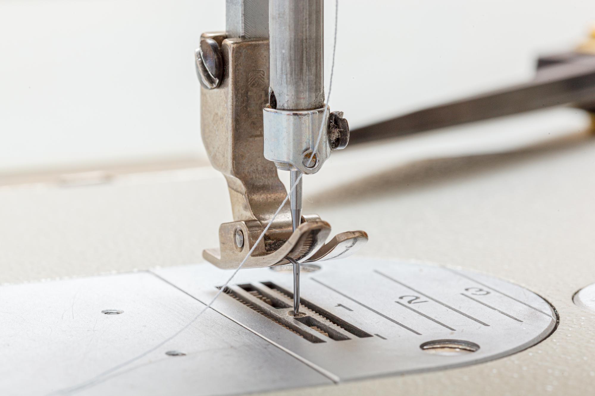 detail of metallic thread monogram